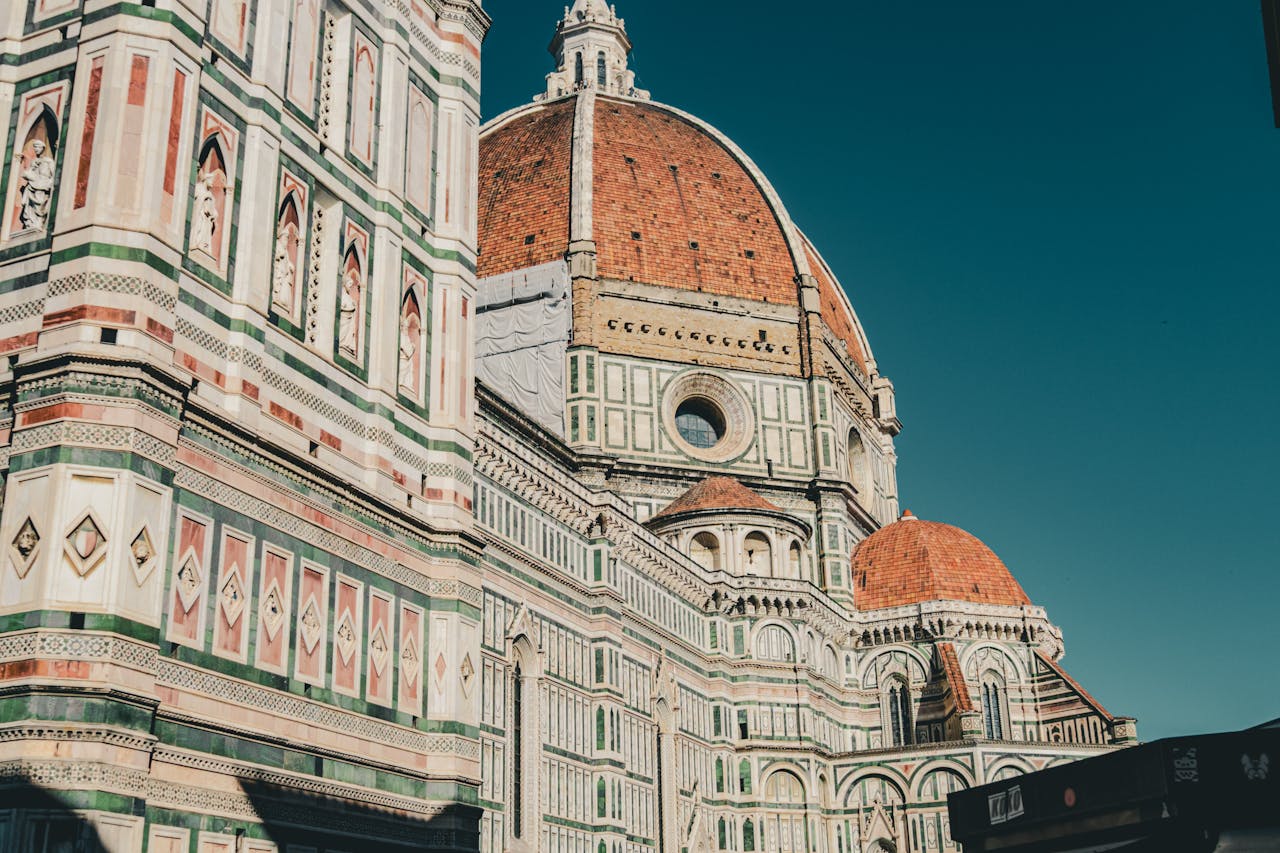 The iconic exterior of Santa Maria del Fiore in Florence with its stunning dome and intricate architecture.